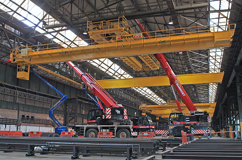 The high rates of material flow and particular processing needs demanded a more innovative crane configuration