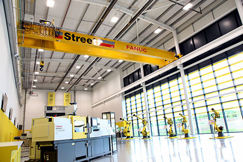 street installed three double girder cranes for Fanuc UK