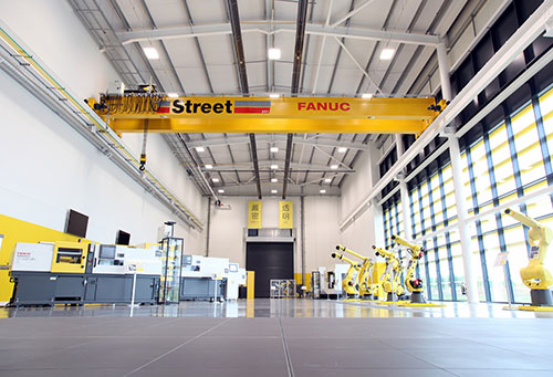 Fanuc UK facility with street crane installation